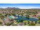 Community aerial view featuring lake, pool, and mountain views in a desirable location at 43507 W Cydnee Dr, Maricopa, AZ 85138