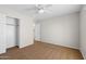 Cozy bedroom with closet space and neutral carpeting at 43507 W Cydnee Dr, Maricopa, AZ 85138