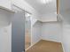 Walk-in closet featuring ample shelving and storage space at 43507 W Cydnee Dr, Maricopa, AZ 85138