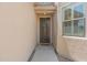 Inviting front entrance with a decorative door and a 'hello' welcome mat at 43507 W Cydnee Dr, Maricopa, AZ 85138