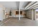A spacious garage with ample storage, work area, and room for multiple vehicles at 43507 W Cydnee Dr, Maricopa, AZ 85138
