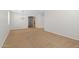 Open-concept living space with neutral walls, carpet, and modern lighting fixture at 43507 W Cydnee Dr, Maricopa, AZ 85138