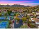 Upscale community featuring tennis courts, well-manicured grounds, and mountain views at 4450 E Camelback Rd # 4, Phoenix, AZ 85018