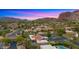 Desert community aerial featuring red rock mountains and manicured landscaping at 4450 E Camelback Rd # 4, Phoenix, AZ 85018