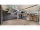 Spacious garage featuring a wall of storage cabinets and overhead racks at 4450 E Camelback Rd # 4, Phoenix, AZ 85018