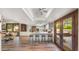 Open kitchen featuring a breakfast bar, stainless steel appliances, and access to an outdoor patio at 4450 E Camelback Rd # 4, Phoenix, AZ 85018