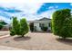 Single-story home with desert landscaping, mature trees, and a well-maintained yard at 508 S Ernie Pl, Tempe, AZ 85281