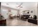 Comfortable living room with wood-look tile flooring and ample natural light at 508 S Ernie Pl, Tempe, AZ 85281