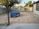 Large backyard with block fence offers ample space for outdoor activities and customization at 5338 W Wolf St, Phoenix, AZ 85031