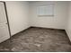 Bedroom with hardwood floors and window at 5338 W Wolf St, Phoenix, AZ 85031