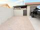 Enclosed parking area with block wall providing secure parking and privacy for vehicles at 5338 W Wolf St, Phoenix, AZ 85031