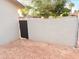 Side yard with block wall offering privacy and security for outdoor activities or storage at 5338 W Wolf St, Phoenix, AZ 85031