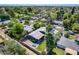 Scenic aerial view of a home featuring solar panels, and beautiful landscaping within a suburban neighborhood at 534 W 15Th St, Tempe, AZ 85281
