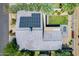 Detailed aerial view highlighting the roof, solar panels, and landscaped backyard of the property at 534 W 15Th St, Tempe, AZ 85281