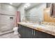 Bathroom with a shower, tiled walls, dual vanity, and granite countertop at 534 W 15Th St, Tempe, AZ 85281