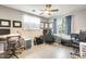 Bright bedroom with a ceiling fan, neutral walls, light wood floors and natural light from the window at 534 W 15Th St, Tempe, AZ 85281