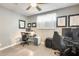 A bedroom with an office setup, a ceiling fan, and natural light at 534 W 15Th St, Tempe, AZ 85281