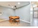 Bright dining area with sleek tile flooring, recessed lighting, and vaulted ceilings, creating an inviting ambiance for meals at 534 W 15Th St, Tempe, AZ 85281