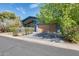 Charming home exterior with wood garage door, modern color scheme, and neat landscaping at 534 W 15Th St, Tempe, AZ 85281