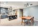 A modern kitchen with an island cooktop and a dining table with seating for six at 534 W 15Th St, Tempe, AZ 85281