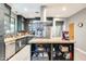A kitchen with stainless steel appliances, granite counters, and gray wood cabinets at 534 W 15Th St, Tempe, AZ 85281