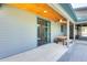Covered patio with a wooden ceiling, ceiling fan, and outdoor dining table and chairs at 534 W 15Th St, Tempe, AZ 85281