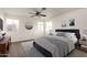 Comfortable bedroom with a ceiling fan, plush rug, ample natural light, and stylish decor at 6873 E Kathleen Rd, Scottsdale, AZ 85254
