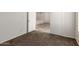 Neutral bedroom featuring carpeted floor and white walls at 6873 E Kathleen Rd, Scottsdale, AZ 85254