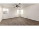 Spacious bedroom featuring neutral carpet and natural light at 6873 E Kathleen Rd, Scottsdale, AZ 85254