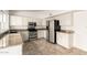 Well-equipped kitchen featuring white cabinets, stainless steel appliances, and granite countertops at 6873 E Kathleen Rd, Scottsdale, AZ 85254