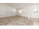 Bright living room featuring neutral tile floors and a view of the front yard at 6873 E Kathleen Rd, Scottsdale, AZ 85254