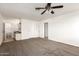 Large main bedroom featuring a ceiling fan and an en-suite bathroom at 6873 E Kathleen Rd, Scottsdale, AZ 85254