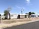 Exterior view of mobile home, including palm trees at 6950 W Karen Lee Ln, Peoria, AZ 85382