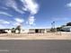 Mobile home with chain link fence and a carport at 6950 W Karen Lee Ln, Peoria, AZ 85382