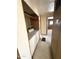 Hallway with laundry closet at 6950 W Karen Lee Ln, Peoria, AZ 85382