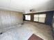 Spacious living room boasts fan, multiple windows, and neutral wall colors at 6950 W Karen Lee Ln, Peoria, AZ 85382