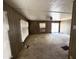 Comfortable living area showcases sliding glass door, fan, and a neutral color palette at 6950 W Karen Lee Ln, Peoria, AZ 85382