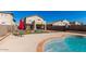 Backyard with a pool and a fenced yard, providing a relaxing and private outdoor space at 7117 W Globe Ave, Phoenix, AZ 85043