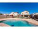 Enjoy the sparkling pool and private backyard, perfect for relaxation and outdoor entertaining at 7117 W Globe Ave, Phoenix, AZ 85043