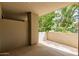 Balcony with views of the trees and property at 7700 E Gainey Ranch Rd # 102, Scottsdale, AZ 85258