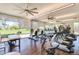 Modern gym with a variety of cardio machines, weight training equipment, and ample natural light at 7700 E Gainey Ranch Rd # 102, Scottsdale, AZ 85258