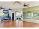 Bright, well-equipped gym with ceiling fans, mirrored wall, and an array of free weights and exercise equipment at 7700 E Gainey Ranch Rd # 102, Scottsdale, AZ 85258