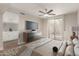 Staged primary bedroom suite with attached bathroom and sliding glass door to the patio at 7700 E Gainey Ranch Rd # 102, Scottsdale, AZ 85258