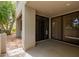 Private covered patio with block wall and sliding glass doors at 7700 E Gainey Ranch Rd # 102, Scottsdale, AZ 85258