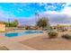 Inviting community pool area with ample seating, perfect for relaxation and enjoying sunny days at 7736 E Hazelwood St, Scottsdale, AZ 85251