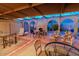 Elegant covered patio featuring comfortable seating areas, perfect for enjoying outdoor living at 7736 E Hazelwood St, Scottsdale, AZ 85251