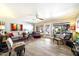 Spacious living room with tile floors, ceiling fan, and large windows providing ample natural light at 7736 E Hazelwood St, Scottsdale, AZ 85251