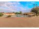 Relaxing pool area with lounge chairs, tables, and shaded seating for residents to enjoy at 7736 E Hazelwood St, Scottsdale, AZ 85251