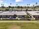 Lovely aerial view showcasing desert home with meticulously landscaped yard and golf course backdrop at 7856 E Via Marina --, Scottsdale, AZ 85258