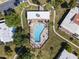 Aerial view of a community pool and jacuzzi, surrounded by landscaped grounds at 7856 E Via Marina --, Scottsdale, AZ 85258